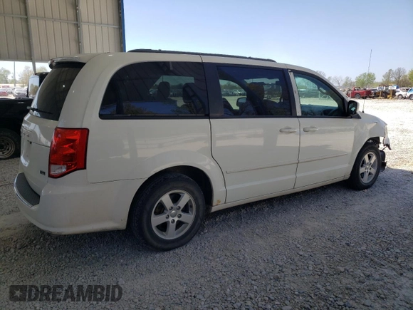 2013 Dodge Grand Caravan SXT with VIN 2C4RDGCG5DR554126, listed as a Copart auction lot 52160805 with 201,161 mi miles and Salvage Title. Bid and sale history available at DreamBid. Image 3.
