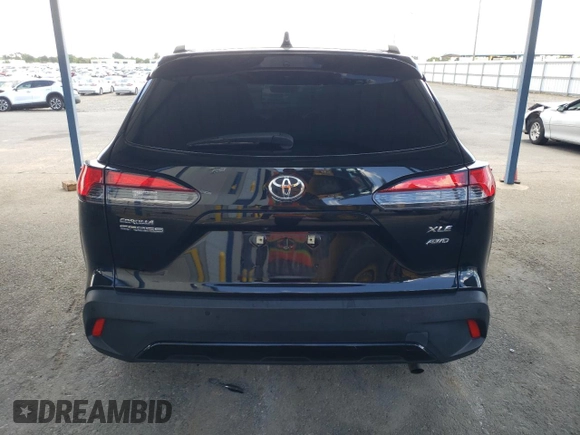 2023 Toyota Corolla Cross XLE z VIN 7MUDAABG6PV048792, wystawiony jako Copart lot #56819095 z przebiegiem 59 189 mil mil oraz Szkoda całkowita • Salvage title. Historia ofert i sprzedaży dostępna na DreamBid. Obrazek 6.