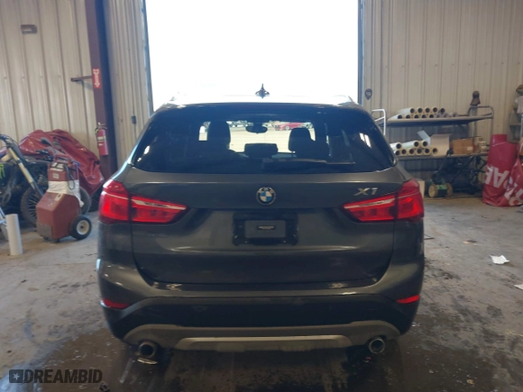 2016 BMW X1 xDrive28i with VIN WBXHT3C3XGP885359, listed as a IAAI auction lot 41743616 with 44,436 mi miles. Bid and sale history available at carsss.com. Image 16.