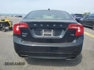 2015 Volvo S60 T5 Drive-E Premier z VIN YV126MFB0F1305289, wystawiony jako Copart lot #59939795 z przebiegiem 90 678 mil mil oraz Czysty tytuł • Clean title. Historia ofert i sprzedaży dostępna na DreamBid. Obrazek 6.