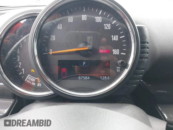 2016 MINI Clubman z VIN WMWLN5C56G2E30309, wystawiony jako IAAI lot #41772501 z przebiegiem 67 584 mil mil oraz . Historia ofert i sprzedaży dostępna na DreamBid. Obrazek 7.