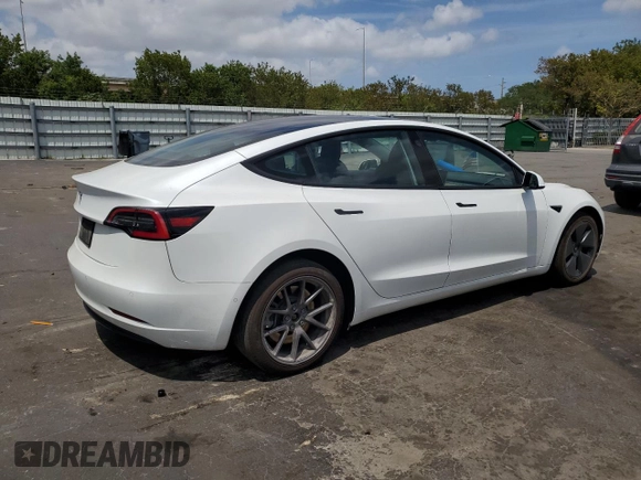 2021 Tesla Model 3 Standard Range Plus with VIN 5YJ3E1EA2MF854713, listed as a Copart auction lot 53783535 with 84,585 mi miles and Non Repairable. Bid and sale history available at DreamBid. Image 3.