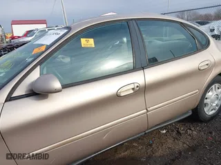1999 Ford Taurus SE with VIN 1FAFP53U3XA131984, listed as a IAAI auction lot 41638566 with 84,836 mi miles. Bid and sale history available at carsss.com. Image 14.