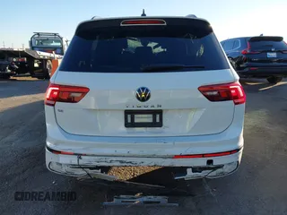 2022 Volkswagen Tiguan SE R-Line Black with VIN 3VVCB7AX1NM022655, listed as a IAAI auction lot 41319977 with 92,860 mi miles and . Bid and sale history available at DreamBid. Image 17.
