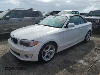 2013 BMW 1 Series 128i with VIN WBAUL7C56DVU09165, listed as a Copart auction lot 74231084 with Not Provided miles and Salvage Title. Bid and sale history available at carsss.com. Image 1.