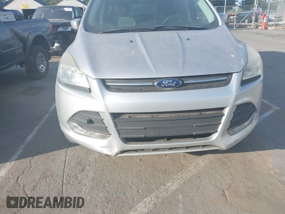 2014 Ford Escape SE z VIN 1FMCU0GX3EUE33604, wystawiony jako IAAI lot #42080186 z przebiegiem 149 930 mil mil oraz . Historia ofert i sprzedaży dostępna na DreamBid. Obrazek 6.