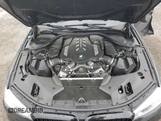 2020 BMW 5 Series M550i xDrive with VIN WBAJS7C06LCD12779, listed as a Copart auction lot 61136215 with 81,286 mi miles and Salvage title. Bid and sale history available at DreamBid. Image 11.
