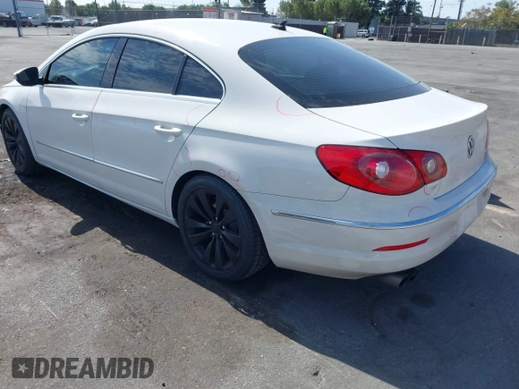 2011 Volkswagen CC Sport with VIN WVWMP7AN2BE721846, listed as a IAAI auction lot 41706556 with 155,679 mi miles and . Bid and sale history available at DreamBid. Image 3.
