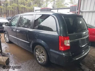 2014 Chrysler Town & Country Touring-L 30th Anniversary with VIN 2C4RC1CG1ER249935, listed as a IAAI auction lot 41553454 with 157,184 mi miles. Bid and sale history available at carsss.com. Image 3.