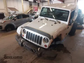 2012 Jeep Wrangler Arctic z VIN 1C4AJWBG9CL233232, wystawiony jako IAAI lot #42282805 z przebiegiem 109 927 mil mil oraz . Historia ofert i sprzedaży dostępna na DreamBid. Obrazek 6.