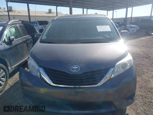 2014 Toyota Sienna LE AAS with VIN 5TDKK3DC0ES498732, listed as a IAAI auction lot 42077044 with 189,745 mi miles and . Bid and sale history available at carsss.com. Image 13.