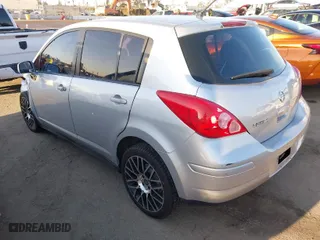 2011 Nissan Versa 1.8 S with VIN 3N1BC1CP2BL448005, listed as a IAAI auction lot 41819138 with 165,936 mi miles. Bid and sale history available at carsss.com. Image 3.