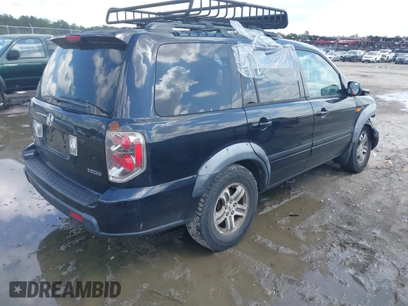 2006 Honda Pilot EX-L with VIN 2HKYF18506H530715, listed as a IAAI auction lot 42195804 with 252,295 mi miles and . Bid and sale history available at DreamBid. Image 4.