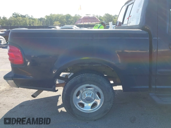 2001 Ford F-150 XLT z VIN 1FTRW07L61KC53030, wystawiony jako IAAI lot #42526499 z przebiegiem 121 675 mil mil oraz . Historia ofert i sprzedaży dostępna na DreamBid. Obrazek 15.