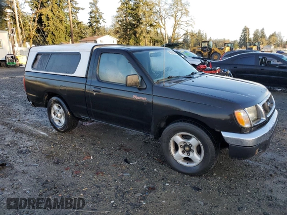 1998 Nissan Frontier XE with VIN 1N6DD21S7WC347623, listed as a Copart auction lot 45347025 with 176,093 mi miles and Salvage title. Bid and sale history available at DreamBid. Image 4.