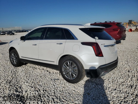 2022 Cadillac XT5 FWD Premium Luxury with VIN 1GYKNCRS1NZ125487, listed as a Copart auction lot 42081675 with 67,702 mi miles and Salvage title. Bid and sale history available at DreamBid. Image 2.