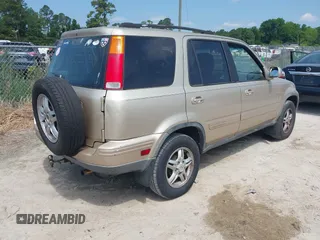 2001 Honda CR-V SE z VIN JHLRD18741C018524, wystawiony jako IAAI lot #42220366 z przebiegiem 248 386 mil mil oraz . Historia ofert i sprzedaży dostępna na DreamBid. Obrazek 4.