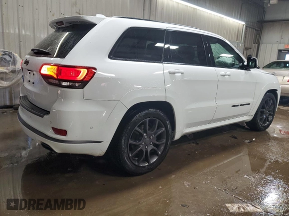2021 Jeep Grand Cherokee Overland with VIN 1C4RJFCGXMC527435, listed as a Copart auction lot 49642405 with 84,485 mi miles and Salvage title. Bid and sale history available at DreamBid. Image 3.