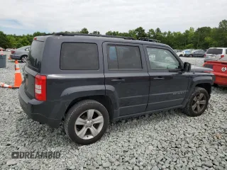 2014 Jeep Patriot Latitude with VIN 1C4NJRFB2ED718259, listed as a Copart auction lot 58095825 with 116,665 mi miles and Salvage title. Bid and sale history available at DreamBid. Image 3.