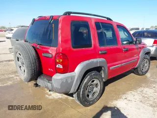 2004 Jeep Liberty Sport with VIN 1J4GL48KX4W108352, listed as a IAAI auction lot 41728648 with 162,132 mi miles. Bid and sale history available at carsss.com. Image 4.
