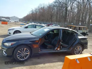 2018 Infiniti Q50 2.0t LUXE with VIN JN1CV7AR1JM280514, listed as a IAAI auction lot 41795656 with 82,496 mi miles. Bid and sale history available at carsss.com. Image 13.