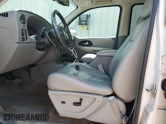 2006 Chevrolet TrailBlazer LS with VIN 1GNDS13S962116896, listed as a Copart auction lot 69937854 with 251,449 mi miles and Salvage Title. Bid and sale history available at DreamBid. Image 7.