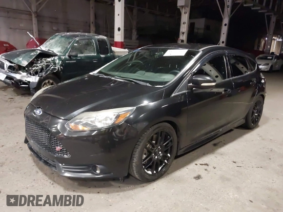 2014 Ford Focus ST with VIN 1FADP3L96EL355713, listed as a IAAI auction lot 41572939 with 102,838 mi miles and . Bid and sale history available at carsss.com. Image 2.