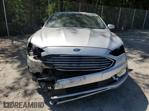 2018 Ford Fusion SE z VIN 3FA6P0HD3JR238137, wystawiony jako Copart lot #54828205 z przebiegiem 131 221 mil mil oraz Szkoda całkowita • Salvage title. Historia ofert i sprzedaży dostępna na DreamBid. Obrazek 5.