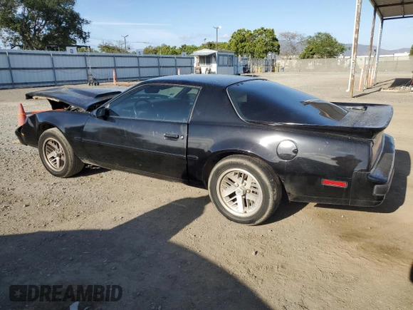 1989 Pontiac Firebird z VIN 1G2FS2186KL212458, wystawiony jako Copart lot #56995025 z przebiegiem 89 851 mil mil oraz Szkoda całkowita • Salvage title. Historia ofert i sprzedaży dostępna na DreamBid. Obrazek 2.