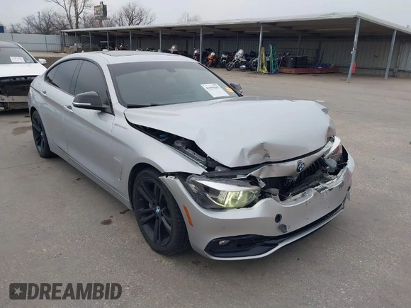 2018 BMW 4 Series 440i with VIN WBA4J5C57JBF07924, listed as a IAAI auction lot 41595682 with 75,121 mi miles and . Bid and sale history available at DreamBid. Image 1.