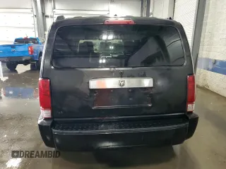 2008 Dodge Nitro SLT z VIN 1D8GU58KX8W206104, wystawiony jako Copart lot #71740974 z przebiegiem 236 981 mil mil oraz Szkoda całkowita • Salvage title. Historia ofert i sprzedaży dostępna na DreamBid. Obrazek 6.
