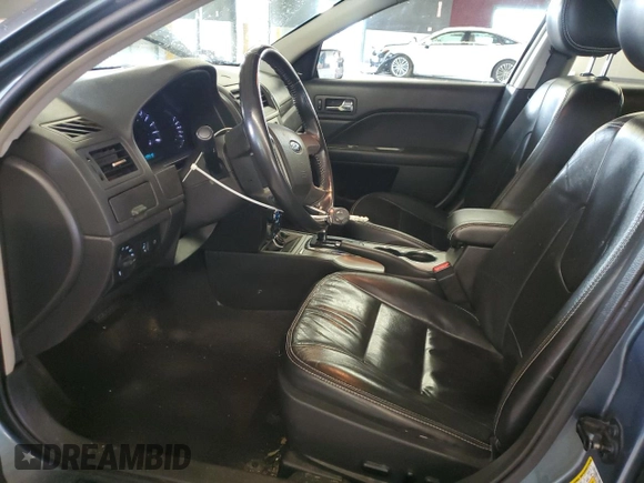 2012 Ford Fusion SEL with VIN 3FAHP0JA4CR174671, listed as a Copart auction lot 53242835 with 140,524 mi miles and Salvage Title. Bid and sale history available at DreamBid. Image 7.