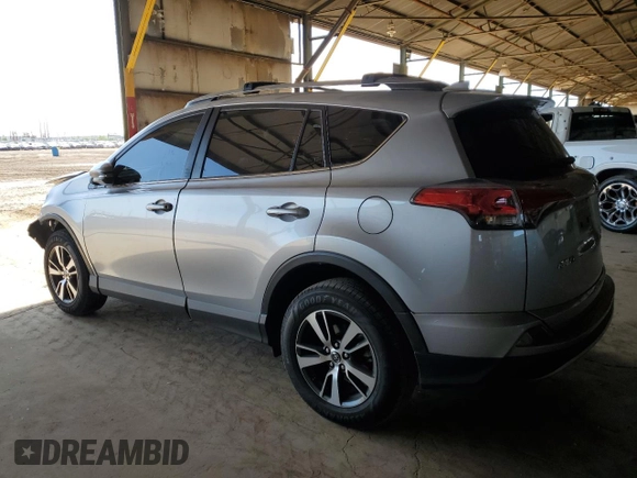 2018 Toyota RAV4 XLE with VIN JTMRFREV1JJ213808, listed as a Copart auction lot 54437805 with 56,972 mi miles and Salvage Title. Bid and sale history available at DreamBid. Image 2.