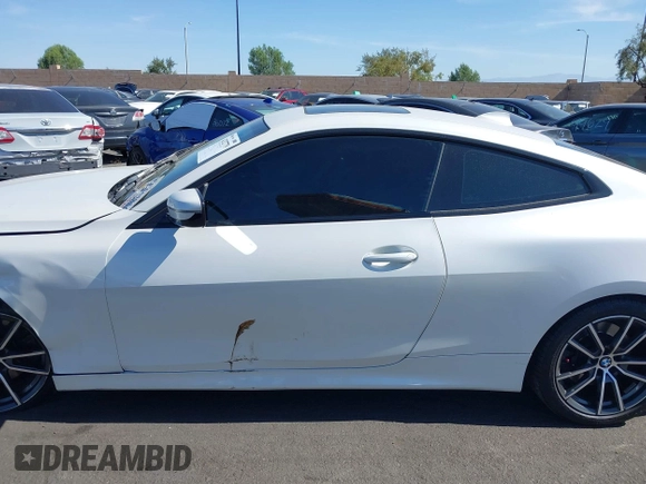 2022 BMW 4 Series 430i xDrive with VIN WBA73AP03NCH61029, listed as a IAAI auction lot 42327779 with 104,860 mi miles and . Bid and sale history available at DreamBid. Image 15.