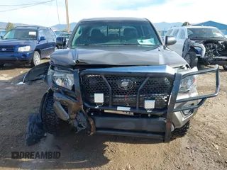 2014 Toyota Tacoma with VIN 3TMLU4EN3EM143882, listed as a IAAI auction lot 40657975 with 125,008 mi miles. Bid and sale history available at carsss.com. Image 12.