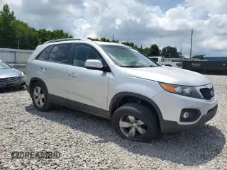 2012 Kia Sorento EX with VIN 5XYKU4A69CG288431, listed as a Copart auction lot 62986595 with 216,323 mi miles and Salvage title. Bid and sale history available at DreamBid. Image 4.