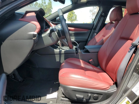 2021 Mazda 3 Premium Plus z VIN JM1BPBNY6M1333768, wystawiony jako Copart lot #60167225 z przebiegiem 32 286 mil mil oraz Szkoda całkowita • Salvage title. Historia ofert i sprzedaży dostępna na DreamBid. Obrazek 7.