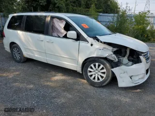 2011 Volkswagen Routan SE with VIN 2V4RW3DG3BR621777, listed as a Copart auction lot 71171124 with 0 mi miles and Salvage Title. Bid and sale history available at carsss.com. Image 4.