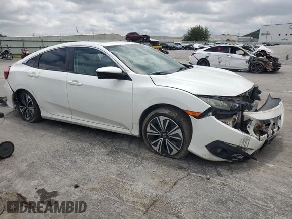 2016 Honda Civic EX-L с VIN 2HGFC1F74GH650713, выставлен на аукционе Copart как лот 58959515 с пробегом Не указан миль и Списание • Salvage title. История ставок и продаж доступна на DreamBid. Изображение 4.