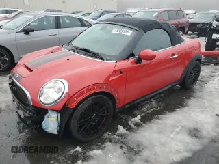 2015 MINI Roadster S z VIN WMWSY3C58FT567023, wystawiony jako Copart lot #43289505 z przebiegiem 115 029 mil mil oraz Szkody całkowita. Historia ofert i sprzedaży dostępna na DreamBid. Obrazek 1.