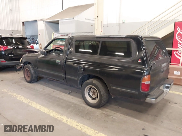 1998 Toyota Tacoma with VIN 4TANL42N4WZ030101, listed as a IAAI auction lot 41735767 with 247,387 mi miles. Bid and sale history available at carsss.com. Image 3.