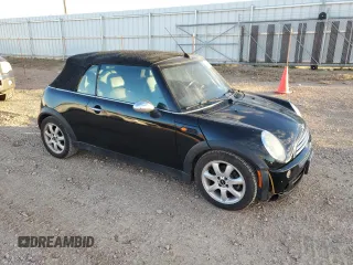 2007 MINI Convertible with VIN WMWRF33597TG16707, listed as a Copart auction lot 79104014 with 113,380 mi miles and Salvage Title. Bid and sale history available at DreamBid. Image 4.