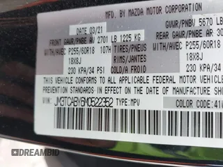 2021 Mazda CX-9 Sport with VIN JM3TCABY6M0522352, listed as a IAAI auction lot 42613136 with 106,167 mi miles and . Bid and sale history available at DreamBid. Image 9.