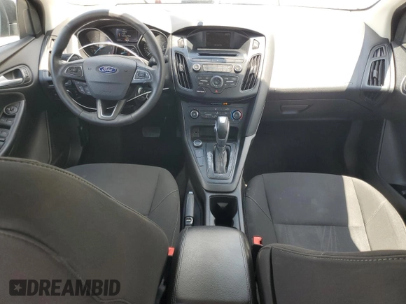 2016 Ford Focus SE with VIN 1FADP3F29GL233719, listed as a Copart auction lot 56857705 with 140,785 mi miles and Salvage title. Bid and sale history available at DreamBid. Image 8.