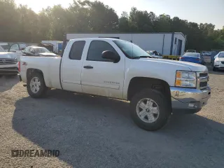 2012 Chevrolet Silverado 1500 LT with VIN 1GCRKSE79CZ104411, listed as a Copart auction lot 53514785 with 156,714 mi miles and Salvage Title. Bid and sale history available at DreamBid. Image 4.