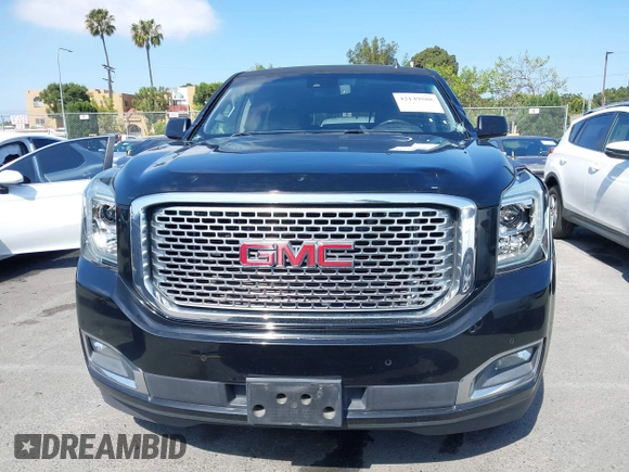 2015 GMC Yukon XL Denali with VIN 1GKS1JKJ1FR134428, listed as a IAAI auction lot 42149588 with 116,207 mi miles. Bid and sale history available at carsss.com. Image 12.