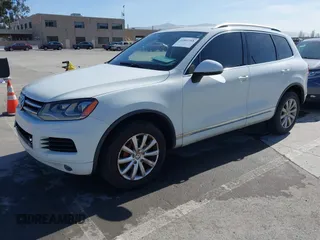 2012 Volkswagen Touareg Sport with VIN WVGEF9BP5CD007294, listed as a IAAI auction lot 41841268 with 160,883 mi miles and . Bid and sale history available at DreamBid. Image 17.