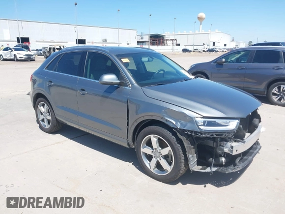 2015 Audi Q3 Prestige with VIN WA1GFCFS7FR013818, listed as a IAAI auction lot 41975076 with 60,295 mi miles and . Bid and sale history available at DreamBid. Image 1.