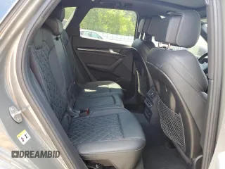 2023 Audi SQ5 Premium Plus z VIN WA1B4AFY4P2083151, wystawiony jako Copart lot #58185645 z przebiegiem 57 751 mil mil oraz Szkoda całkowita • Salvage title. Historia ofert i sprzedaży dostępna na DreamBid. Obrazek 11.
