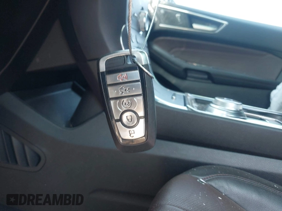 2020 Ford Edge Titanium z VIN 2FMPK4K96LBB46218, wystawiony jako IAAI lot #42750160 z przebiegiem 56 720 mil mil oraz . Historia ofert i sprzedaży dostępna na DreamBid. Obrazek 11.